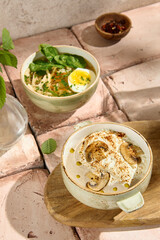 Still Life with Authentic Chicken and Mushroom Soups, Textured Aesthetic in Sunlit Beige Setting