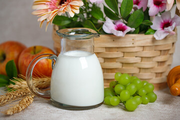 Jewish holiday Shavuot concept, dairy products, fruit wheat