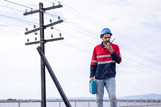 Electrical engineer man checking Power at Contruction Site. electrical engineer inspect the electrical systems at the equipment site