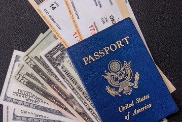 Fototapeta premium United States of America passport, airline tickets and money