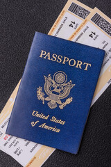 United States of America passport, airline tickets and money