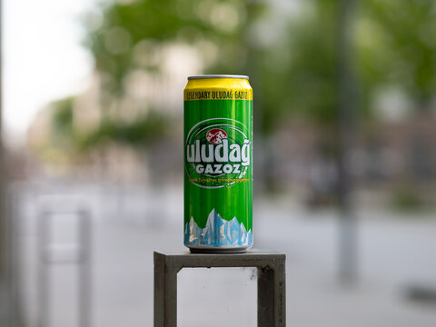 DRESDEN, GERMANY - 10. May 2024: Uludağ Gazoz Turkish softdrink in a can outdoors. The sweet beverage is a carbonated lemonade. Summer drink in an urban environment.
