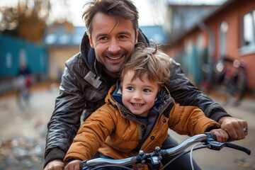 A happy father and toddler son sharing a fun bike ride together on a vibrant street