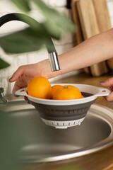 Wash the orange. Juicy oranges are washed.