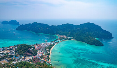 Aerial view landscape longtail boat on Phi Phi island from drone, travel landmark of Thailand