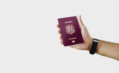 Man holding Andorran Passport in hand on white background with copy space - Andorra