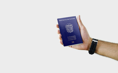 Man holding PANAMA Passport in hand on white background with copy space - Panamanian