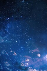 Fototapeta premium A dark blue night sky filled with many stars