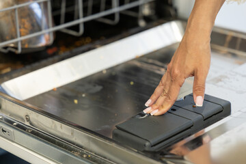 putting the bar of soap in the dishwasher to turn it on