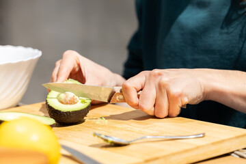 making homemade guacamole with different vegetables. culinary arts