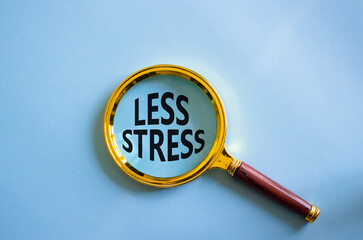 Less stress symbol. Magnifying glass with words Less stress. Beautiful blue background. Healthcare...