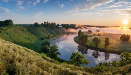Obraz premium panorama of a summer landscape with sunrise, fog and the river