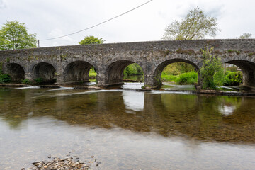 The river Barle flowing under Withypool bridge in Exmoor National Park
