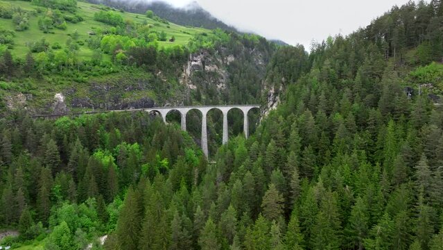 Landwasser viaduct in Switzerland mountain from drone
