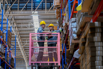 workers man and woman using a hydraulic scissor lift to check stock near the shelves warehouse. industry factory warehouse. Worker Screening Package In Warehouse.