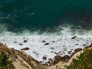 View of the coast from Cape Roca (Cabo da Roca), the westernmost point of the Sintra Mountain Range, of mainland Portugal, of continental Europe and of the Eurasian landmass