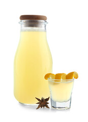 Bottle and shot of tasty Limoncello on white background