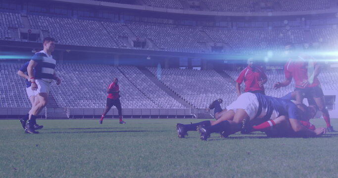 Image of glowing lights over diverse rugby players in sports stadium