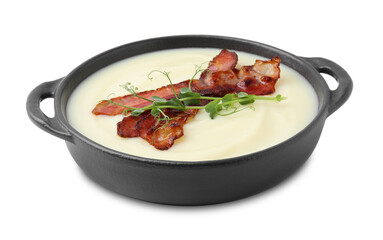 Delicious potato soup with bacon and microgreens in bowl isolated on white