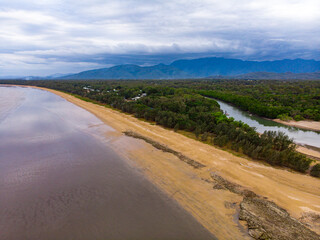 aerial drone panorama of rollingstone creek river mouth in beautiful rural town balgal beach; unique coastline of tropical north queensland near townsville, australia	