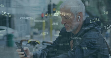 Image of changing numbers against caucasian senior man using smartphone on the street