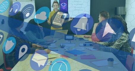 Image of multiple icons over diverse female giving presentation to coworkers in office