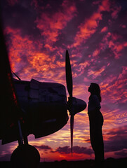 the pioneering aviatrix, standing proudly next to her plane, the Lockheed Vega 5B, on an airfield at dusk The sky is painted in hues of red and purple, creating a striking silhouette photo