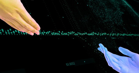 Image of human and alien hand over data processing