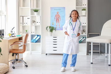 Little African-American doctor in clinic