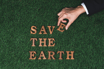 Eco awareness campaign for Earth day concept showcase message arranged in Save Earth on biophilic...