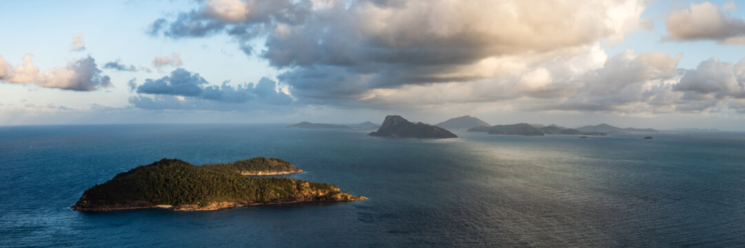 Dramatic sunset on the ocean, panoramic seascape, Whitsundays, Australia