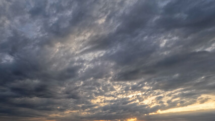 cute sunset golden clouds on the sky backdrop - photo of nature
