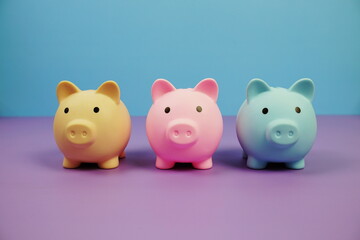 Piggy Bank Saving finance concept on blue and purple background