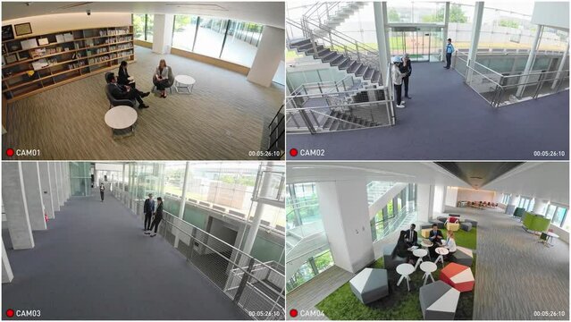 Security camera quad monitor screen interface. Surveillance camera video.