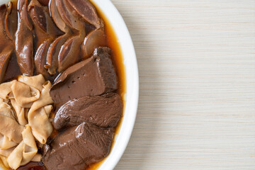 stewed duck offal in brown soup
