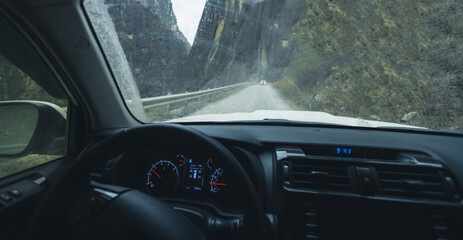 Driving car on the landslide road, China