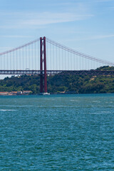 The 25th April Bridge, Ponte 25 de Abril in Portuguese, the longest suspension bridge in Europe. Connecting the city of Lisbon, capital of Portugal, to the municipality of Almada over the Tagus River.