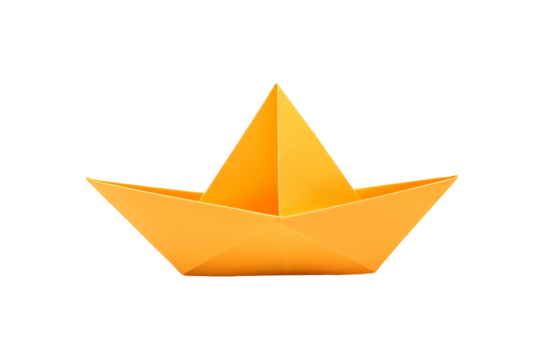 a yellow paper boat on a white background