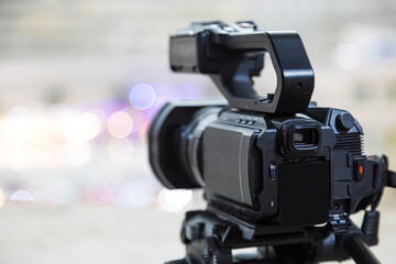 Video camera with blur background for journalist interview broadcasting reporter news or press...