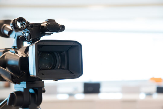 Video camera with blur background for journalist interview broadcasting reporter news or press conference speaker or public speaking or meeting report record and content creator live media concepts.
