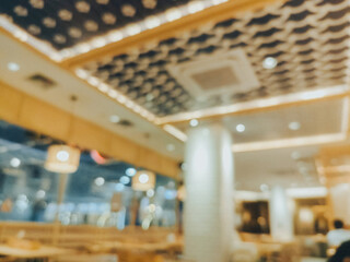 Blurred photo of Japanese restaurant interior with rounded bokeh