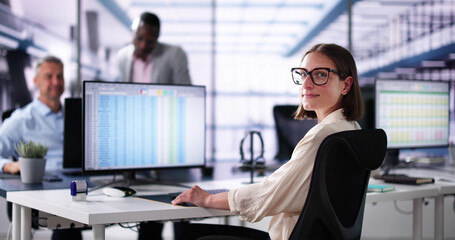 Data Analyst African Woman Using Spreadsheet