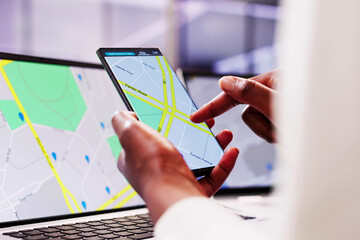 Real Estate Agent Locating Property with GPS Navigation Map on Smartphone