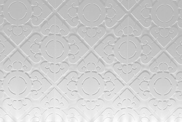 Vintage Thai Sculpture Wall Background with Light Beam from the Bottom.