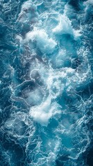 Fototapeta premium The image is of a large body of water with waves crashing against the shore