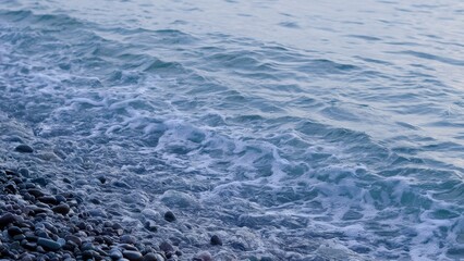 deep blue sea water background structure on the sunset