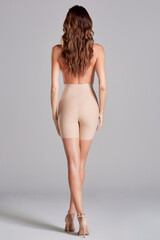 Obraz premium Female model wearing corset bra and women underwear.