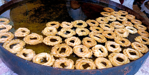 Making of Imarti or Amriti at sweet shop in India
