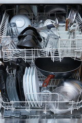 Dish washer filled with dirty dishes