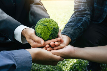 Environment World Earth Day Concept. Hands of People holding green globe for Care, Saving Protecting Planet Together. Sustainable environment development. Green business, Energy Renewable